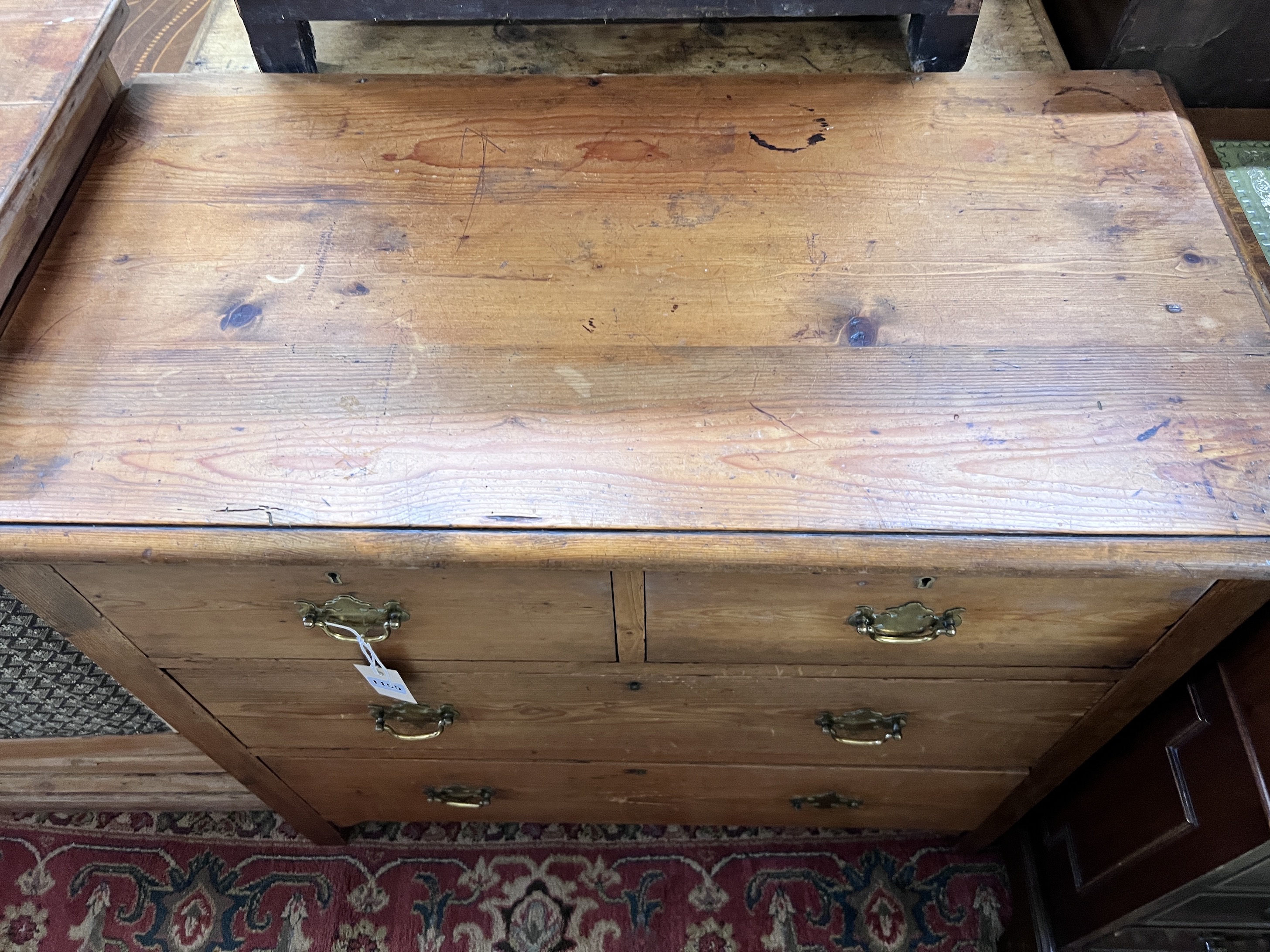 An Edwardian pine chest of four drawers, width 92cm